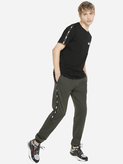 Spodnie dresowe męskie Puma Ess+ Tape Fl Cl 849042-70 L Zielone (4064535820072) - obraz 3