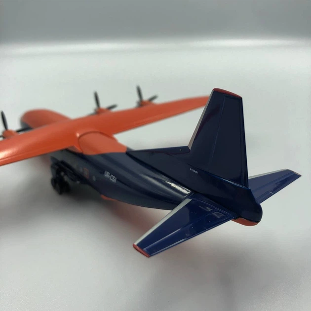 Модель літака Aнтонов Ан -12 Cavok (ATMA) Reg: UR-СSJ (помаранчевий/чорний) (без логотипу) - Фото 5 Модель літака Aнтонов Ан -12 Cavok (ATMA) Reg: UR-СSJ (помаранчевий/чорний) (без логотипу) - изображение 5
