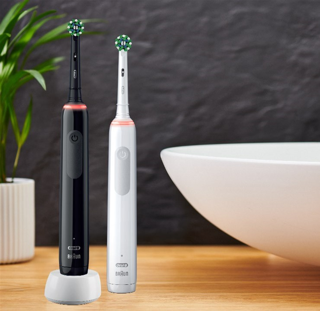 Zestaw elektrycznych szczoteczek Oral-B Pro3 3900 CrossAction Black+White - obraz 8
