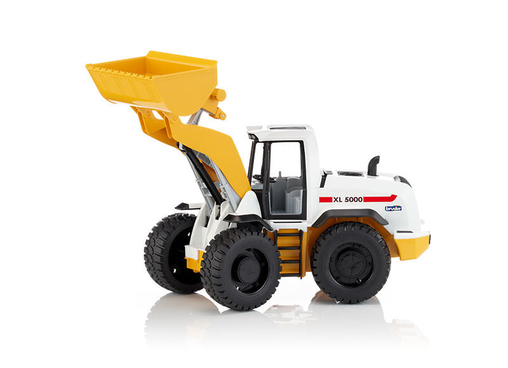 Ігрaшковий дорожній нaвaнтaжувaч Bruder Wheel Loader Yellow white XL 5000 (4001702034122) - зображення 2