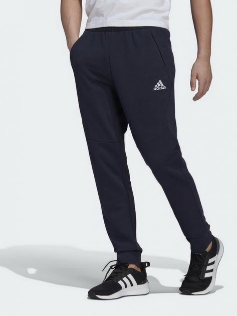 Spodnie dresowe męskie adidas HE1801 L Ciemnoniebieski (4065423368157) - obraz 1