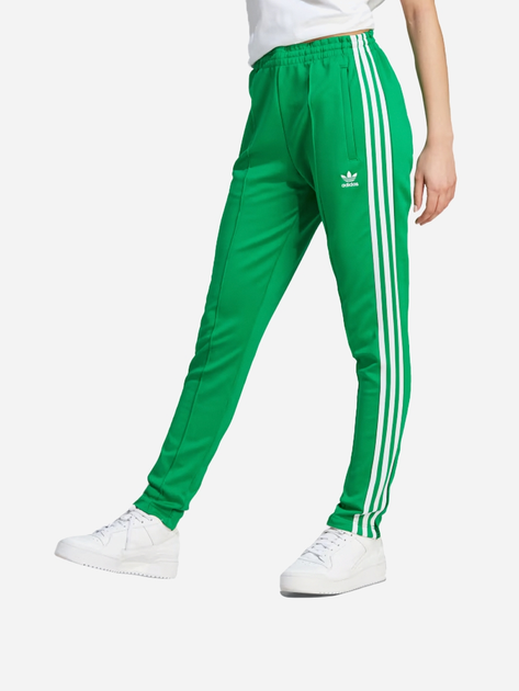 Spodnie sportowe damskie adidas IK6601 XS Zielone (4066761199076) - obraz 1