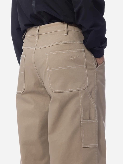 Spodnie regular fit męskie Nike FB7198-247 32 Beżowe (196609034772) - obraz 4