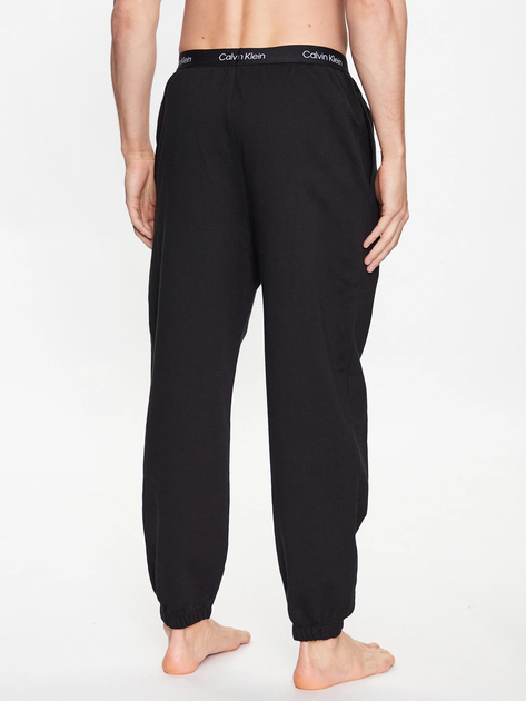 Spodnie dresowe męskie Calvin Klein Underwear 000NM2393E-UB1 L Czarne (8720107557154) - obraz 2