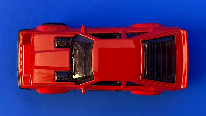 Машинка Базова Hot Wheels '82 Toyota Supra The `80S 1:64 HKG87 Red