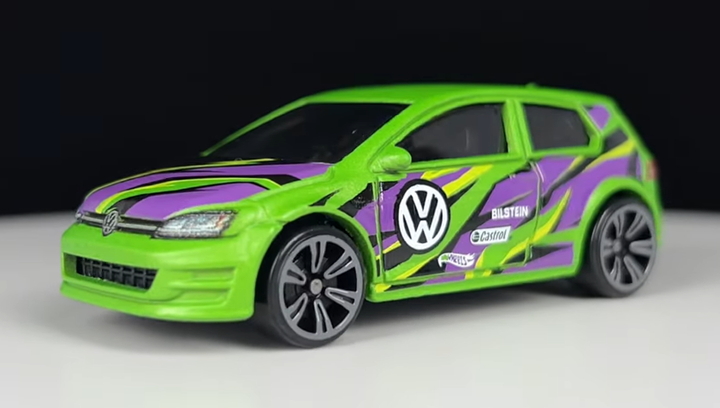 Тематична Машинка Hot Wheels Volkswagen Golf Mk7 Neon Speeders 1