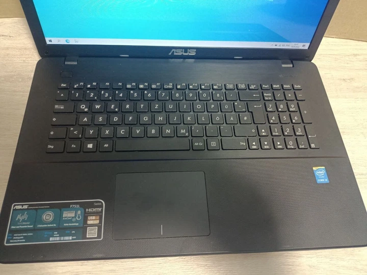 Ноутбук Asus F751L / 17.3" (1600x900) TN / Intel Core i3-5005U (2 (4) ядра по 2.0 GHz) / 8 GB DDR3 / 128 GB SSD / Intel HD Graphics 5500 / WebCam / VGA б/в - Фото 4 Ноутбук Asus F751L / 17.3" (1600x900) TN / Intel Core i3-5005U (2 (4) ядра по 2.0 GHz) / 8 GB DDR3 / 128 GB SSD / Intel HD Graphics 5500 / WebCam / VGA б/в - зображення 4