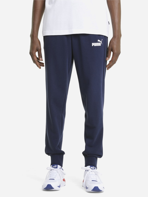 Спортивні штани чоловічі Puma Ess Logo Pants Tr Cl 58671606 M Темно-сині (4063697296879) - зображення 1