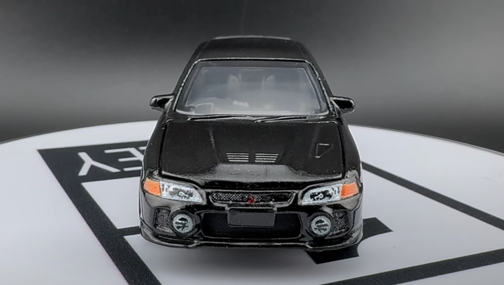 Тематична Машинка Matchbox Mitsubishi 1996 Mitsubishi Lancer Evolution IV Moving Parts 1:64 FWD28/HVM98 Black - зображення 6