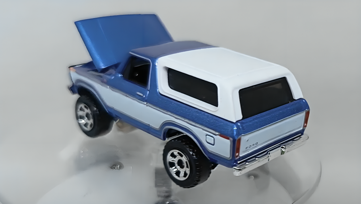 Тематична Машинка Matchbox 1978 Ford Bronco Moving Parts 1:64 FWD28/HVM87 White - Фото 7 Тематична Машинка Matchbox 1978 Ford Bronco Moving Parts 1:64 FWD28/HVM87 White - зображення 7