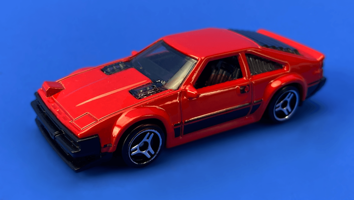 Набір Машинка Базова Hot Wheels Toyota Supra Then and Now 1:64 HCV16 Red + Машинка Базова '82 Supra - зображення 4