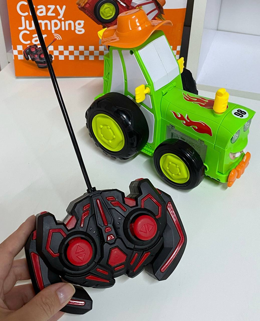 Дитячий музичний тракторець Crazy Jumping Car 2101А на радіо-керуванні "Шалений трактор" Зелений - зображення 2