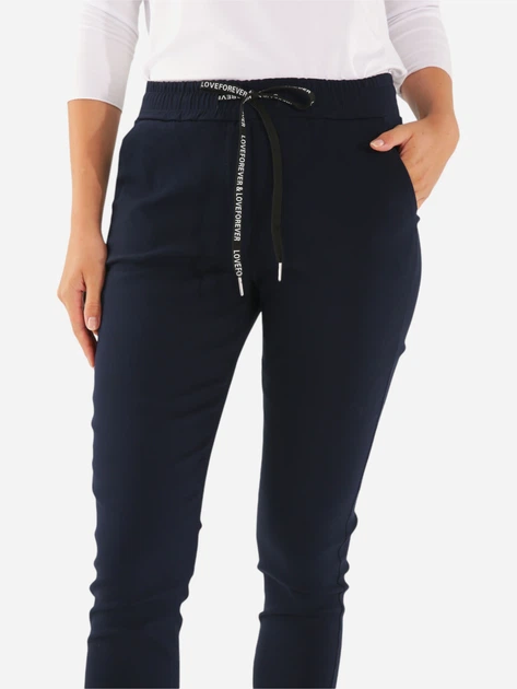 Spodnie slim fit damskie Unisono 224-5598 S Granatowe (5906140650806) - obraz 3