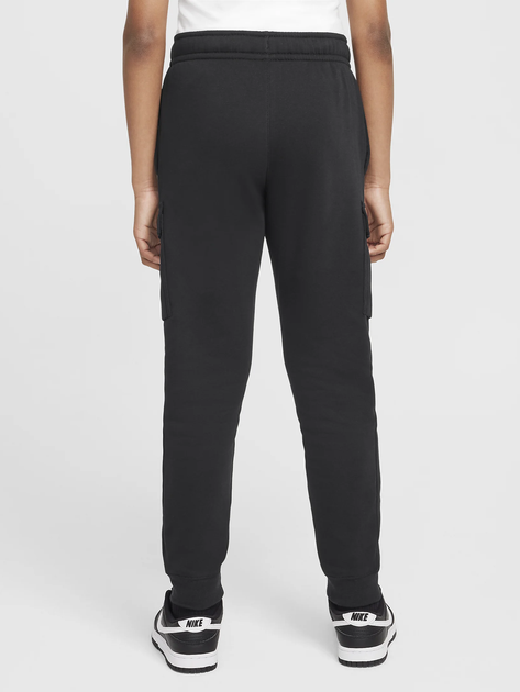 Подростковые теплые спортивные штаны на флисе для мальчика Nike B Nsw Si Cargo Pant Bb HM4337-010 137-147 см Черные (197599796923) - Фото 2 Подростковые теплые спортивные штаны на флисе для мальчика Nike B Nsw Si Cargo Pant Bb HM4337-010 137-147 см Черные (197599796923) - изображение 2