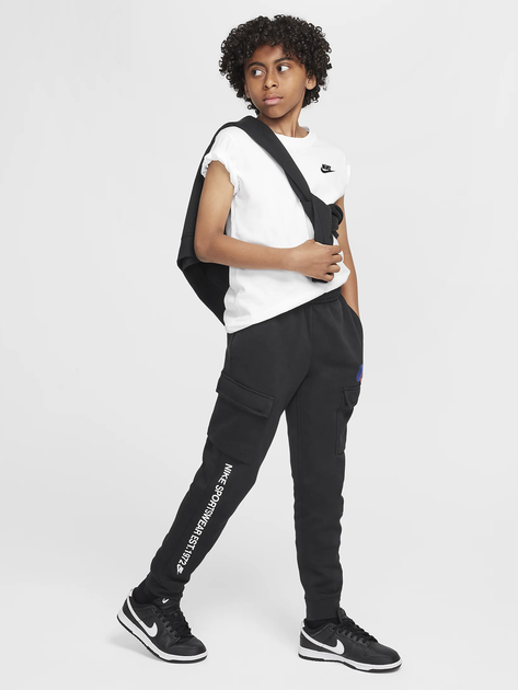 Подростковые теплые спортивные штаны на флисе для мальчика Nike B Nsw Si Cargo Pant Bb HM4337-010 137-147 см Черные (197599796923) - Фото 3 Подростковые теплые спортивные штаны на флисе для мальчика Nike B Nsw Si Cargo Pant Bb HM4337-010 137-147 см Черные (197599796923) - изображение 3