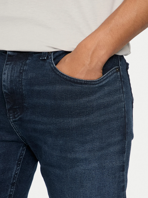 Jeansy slim fit męskie Tommy Hilfiger DM0DM19306-1BK 32/32 Niebieskie (8720636598857) - obraz 4