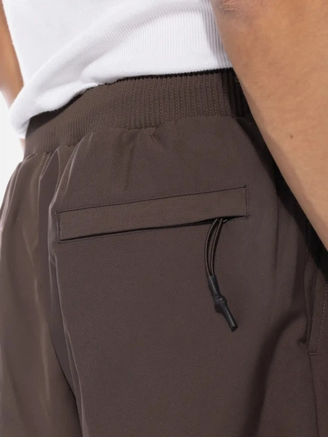 Spodnie regular fit męskie Nike FB7525-237 L Brązowe (196607626153) - obraz 3