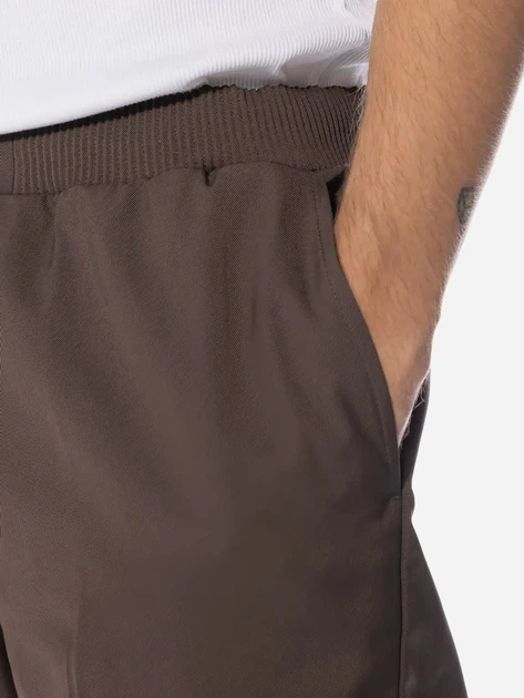 Spodnie regular fit męskie Nike FB7525-237 M Brązowe (196607626146) - obraz 6