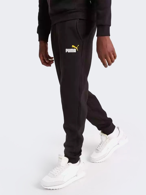 Дитячі теплі спортивні штани на флісі для хлопчика Puma Ess+ 2 Col Logo Pants Fl Cl 586988-54 122-128 см Чорні (4065449096041) - зображення 1