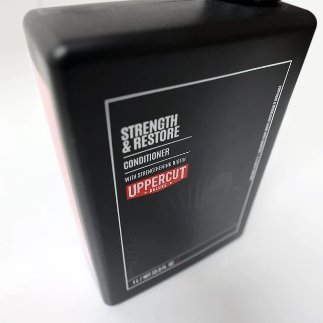 Кондиціонер для волосся Uppercut Deluxe Strength and Restore Conditioner 1000 мл 817891024868 - Фото 5 Кондиціонер для волосся Uppercut Deluxe Strength and Restore Conditioner 1000 мл 817891024868 - зображення 5