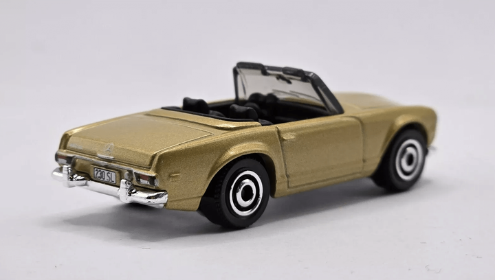 Машинка Велике Місто Matchbox 1963 Mercedes-Benz 230 SL Showroom 1:64 JBR79/JBP22 Gold - Фото 3 Машинка Велике Місто Matchbox 1963 Mercedes-Benz 230 SL Showroom 1:64 JBR79/JBP22 Gold - зображення 3