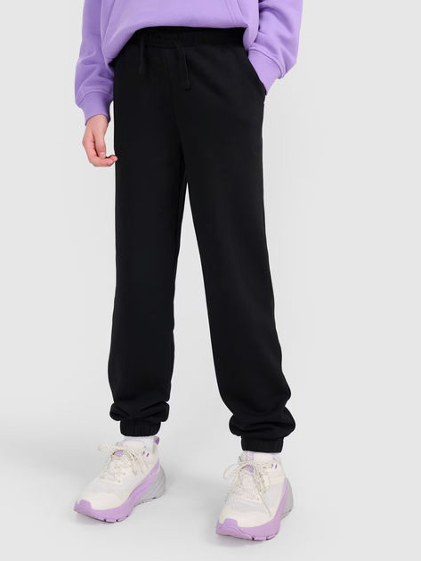 Spodnie dresowe młodzieżowe dziewczęce joggery 4F 4FJWMM00TTROF1189-20S 146 cm Czarne (5905700384632) - obraz 1