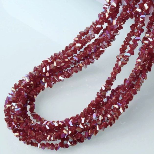 Намистини Swarovski ограновування трикутник 6 мм 30 см (+-85 шт.) Бордовий темний АВ непрозорий (БС6098т77) - Фото 1 Намистини Swarovski ограновування трикутник 6 мм 30 см (+-85 шт.) Бордовий темний АВ непрозорий (БС6098т77) - зображення 1