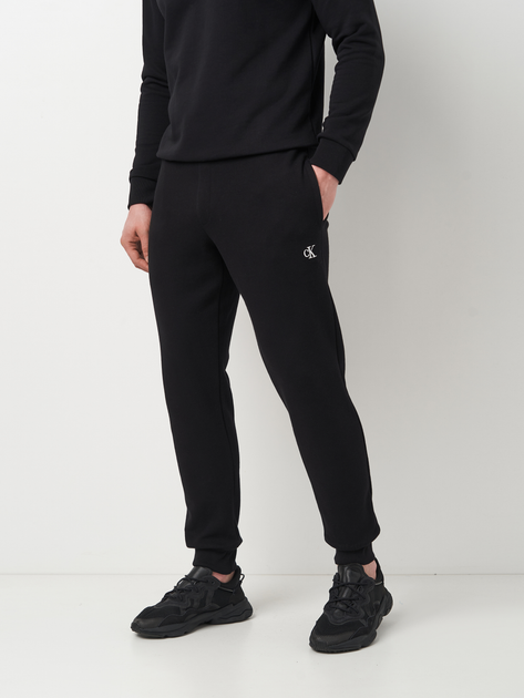 Спортивні штани чоловічі Calvin Klein Jeans 11432.1 XL Чорні від Rozetka на платформі USKIDKA Акція на Спортивні штани чоловічі Calvin Klein Jeans 11432.1 XL Чорні від Rozetka