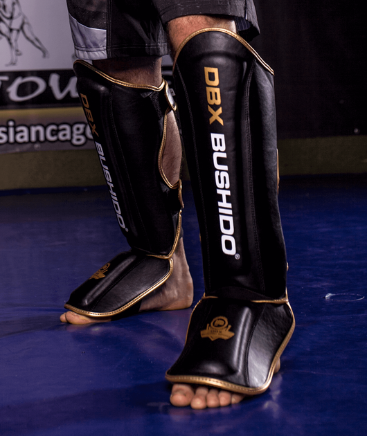 Ochraniacze piszczele i stopy Bushido SP-10v4 M Black/Gold (5902539015966) - obraz 15