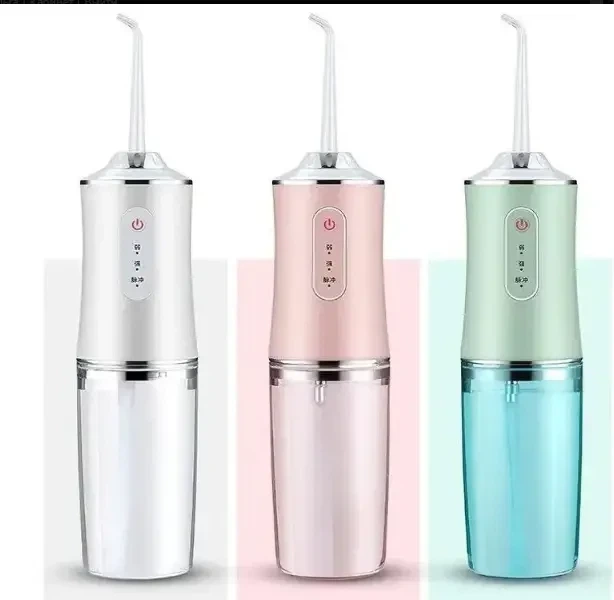 Ирригатор для зубов и полости рта ORAL IRRIGATOR портативний ирригатор - изображение 5