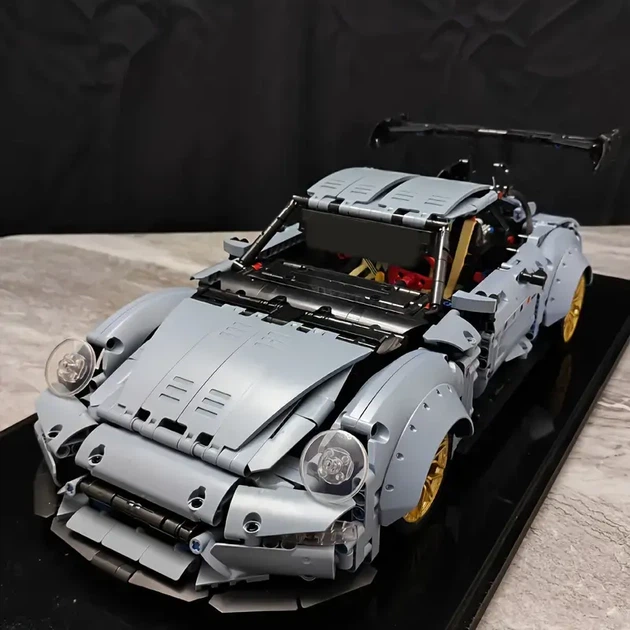 Конструктор Porsche Carrera на 2100 деталей в масштабе 1:14 коллекционный автомобиль - Фото 7 Конструктор Porsche Carrera на 2100 деталей в масштабе 1:14 коллекционный автомобиль - изображение 7