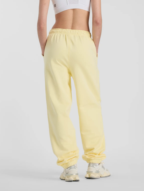 Спортивні штани жіночі New Balance Nb Athletics WP41513 L Жовті (197967309977) - зображення 2