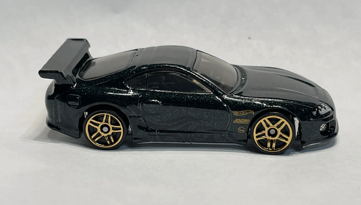 Машинка Базовая Hot Wheels Toyota Supra The `90S 1:64 HTB09 Green
