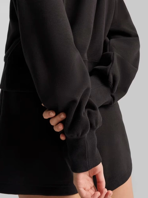 Bluza damska z kapturem Puma Wardrobe Ess Relaxed Cropped Hoodie Tr 62974601 L Czarna (4067983650833) - obraz 4