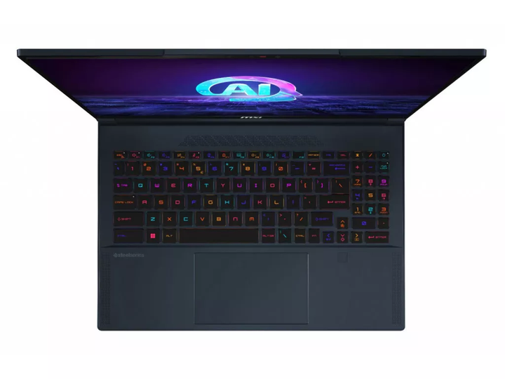 Ноутбук MSI Stealth 16 AI Studio Star Blue 16" IPS 2560x1600 240 Гц / Intel Core Ultra 9 185H 5.1 ГГц / NVIDIA GeForce RTX 4060 8 ГБ / RAM 32 ГБ DDR5 / SSD 2 ТБ / ОС Windows 11 Home / 1.99 кг (A1VFG-212CA) - Фото 3 Ноутбук MSI Stealth 16 AI Studio Star Blue 16" IPS 2560x1600 240 Гц / Intel Core Ultra 9 185H 5.1 ГГц / NVIDIA GeForce RTX 4060 8 ГБ / RAM 32 ГБ DDR5 / SSD 2 ТБ / ОС Windows 11 Home / 1.99 кг (A1VFG-212CA) - изображение 3