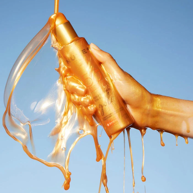 Olejek do opalania Nuxe Sun Gold SPF 50 z drobinkami słonecznego blasku 150 ml (3264680042003) - obraz 2