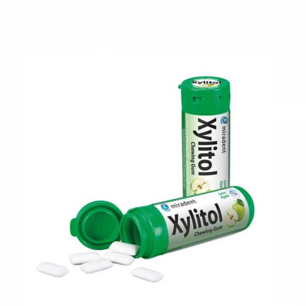 Жувальна гумка з ксилітом Miradent Xylitol Apple (яблуко), 30 шт - Фото 3 Жувальна гумка з ксилітом Miradent Xylitol Apple (яблуко), 30 шт - зображення 3