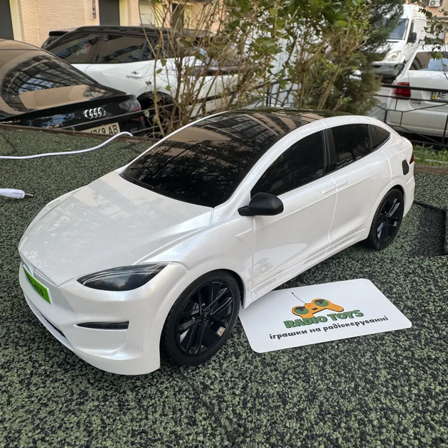 Інерційна металопластикова машинка PM3417 Tesla Model Х на радіокеруванні з зарядною станцією Біла - Фото 6 Інерційна металопластикова машинка PM3417 Tesla Model Х на радіокеруванні з зарядною станцією Біла - зображення 6