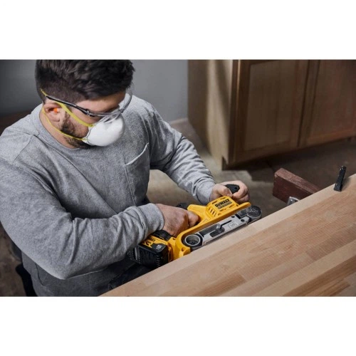 Шліфувальна машина DeWALT XR Li-Ion 18 В 2x5Ah, 198-320 м/хв, стрічка 75х533 мм (DCW220P2) DeWALT DCW220P2 992582 - Фото 9 Шліфувальна машина DeWALT XR Li-Ion 18 В 2x5Ah, 198-320 м/хв, стрічка 75х533 мм (DCW220P2) DeWALT DCW220P2 992582 - зображення 9