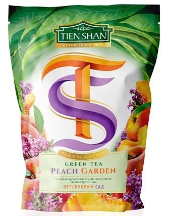 Чай зелений Тянь Шань Tien Shan Peach Garden 80г - Фото 1 Чай зелений Тянь Шань Tien Shan Peach Garden 80г - зображення 1