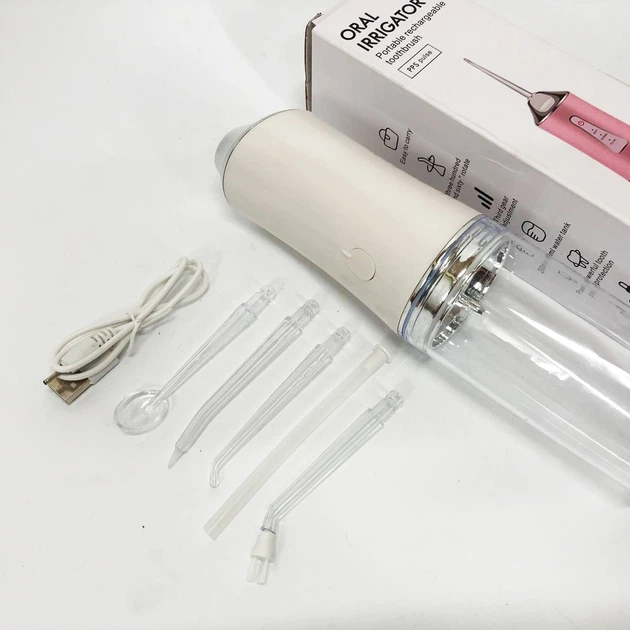 Ирригатор для чистки зубов и полости рта Oral Irrigator с аккумулятором и сменными насадками White - Фото 7 Ирригатор для чистки зубов и полости рта Oral Irrigator с аккумулятором и сменными насадками White - изображение 7