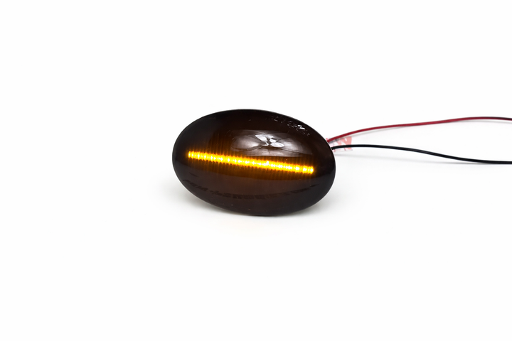 Динамічні LED повторювачі поворотів MINI Cooper R56 R57 R58 R59 2007-2013 тоновані CANBUS - зображення 2