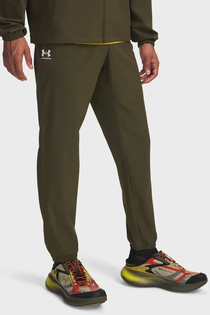 Чоловічі темно-зелені спортивні штани UA Vibe Woven Jogger Under Armour M 1386557-308 - Фото 1 Чоловічі темно-зелені спортивні штани UA Vibe Woven Jogger Under Armour M 1386557-308 - изображение 1