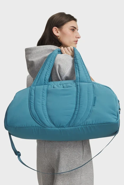 Жіноча блакитна спортивна сумка UA Studio Soft Duffle Under Armour OSFM 6009628-466 - Фото 2 Жіноча блакитна спортивна сумка UA Studio Soft Duffle Under Armour OSFM 6009628-466 - изображение 2