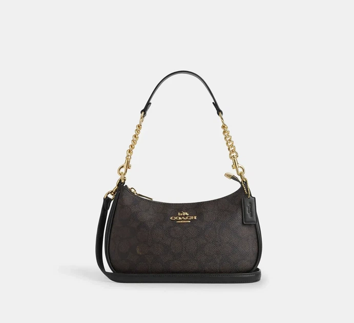 Елегантна жіноча сумка Coach Signature Canvas Shoulder Bag (Коричнева/Чорна), через плече півмісяцем - Фото 1 Елегантна жіноча сумка Coach Signature Canvas Shoulder Bag (Коричнева/Чорна), через плече півмісяцем - зображення 1