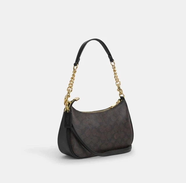 Елегантна жіноча сумка Coach Signature Canvas Shoulder Bag (Коричнева/Чорна), через плече півмісяцем - Фото 2 Елегантна жіноча сумка Coach Signature Canvas Shoulder Bag (Коричнева/Чорна), через плече півмісяцем - зображення 2