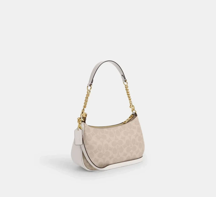 Жіноча сумка Coach Teri Shoulder Bag Signature Canvas Light Khaki Кросбоді Багет Біла - Фото 2 Жіноча сумка Coach Teri Shoulder Bag Signature Canvas Light Khaki Кросбоді Багет Біла - зображення 2