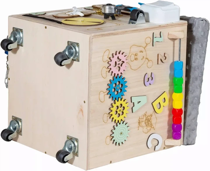 Pufa sensoryczna Montessori 3toysm Tablica manipulacyjna z siedziskiem kółeczkami (PM1) (5905325439045) - obraz 6