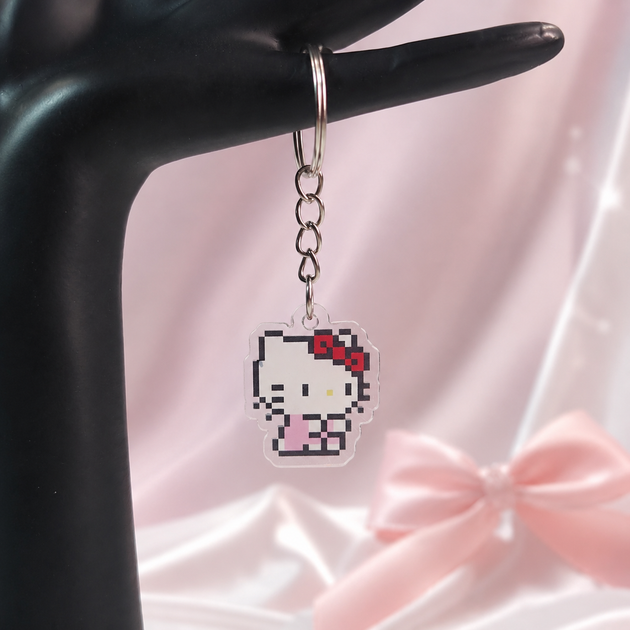 Акриловий брелок Hello Kitty (Хеллоу Кітті) піксельний 3×2 см 013 - Фото 2 Акриловий брелок Hello Kitty (Хеллоу Кітті) піксельний 3×2 см 013 - зображення 2