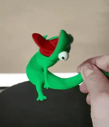 Подвижная ящерица Том на пружине. Lizard Tom — антистресс-игрушка, фигурка персонажа из мультфильма «Хопс». - изображение 6